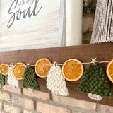 flat crochet christmas trees and dried orange garland