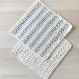 two crochet dishcloths laying flat