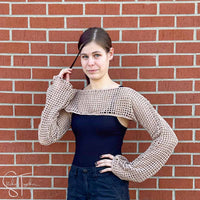 teen wearing a crochet crop sweater