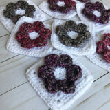 crochet flower squares in white and various colors
