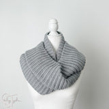 gray ribbed crochet infinity scarf on the neck of a headless mannequin