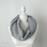 ribbed crochet infinity scarf on the neck of a headless mannequin