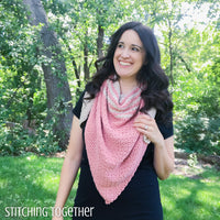 woman wearing a crochet triangle scarf