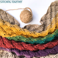 crochet wrap and ball of yarn