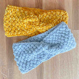 2 crochet headbands with twists laying flat