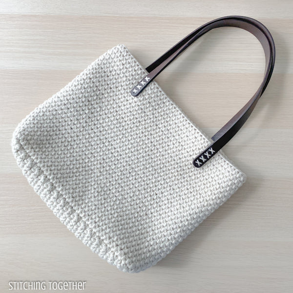 crochet shoulder bag with faux leather straps