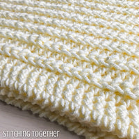 edge of a chunky baby blanket in crochet