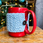 crochet mug cozy on red coffee mug
