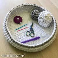 crochet tools and yarn in a bowl