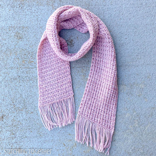 pink crochet fringe scarf