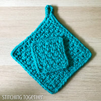teal crochet potholder with a smaller crochet square