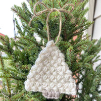 crochet christmas tree ornament hung with twine