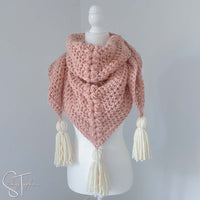 bulky scarf with tassels on mannequin 