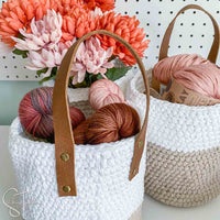 leather strap on a crochet basket