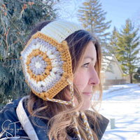 woman wearing crochet ear warmer with ear flaps