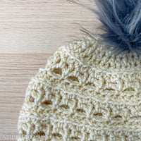 close up of crochet stitches on a womens beanie