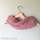 pink crocheted cowl hanging