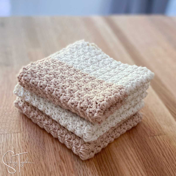3 folded and stacked crochet dishcloths