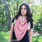 woman wearing crochet triangle shawl